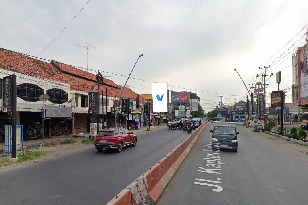 Billboard Jl. Kapten Sudibyo (Lampu Merah Perempatan Mall Pasifik), Tegal
