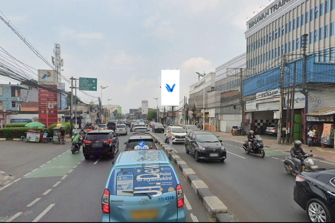 Billboard Jl. Dewi Sartika (Dekat Lampu Merah Kampus Binawan), Jakarta Timur